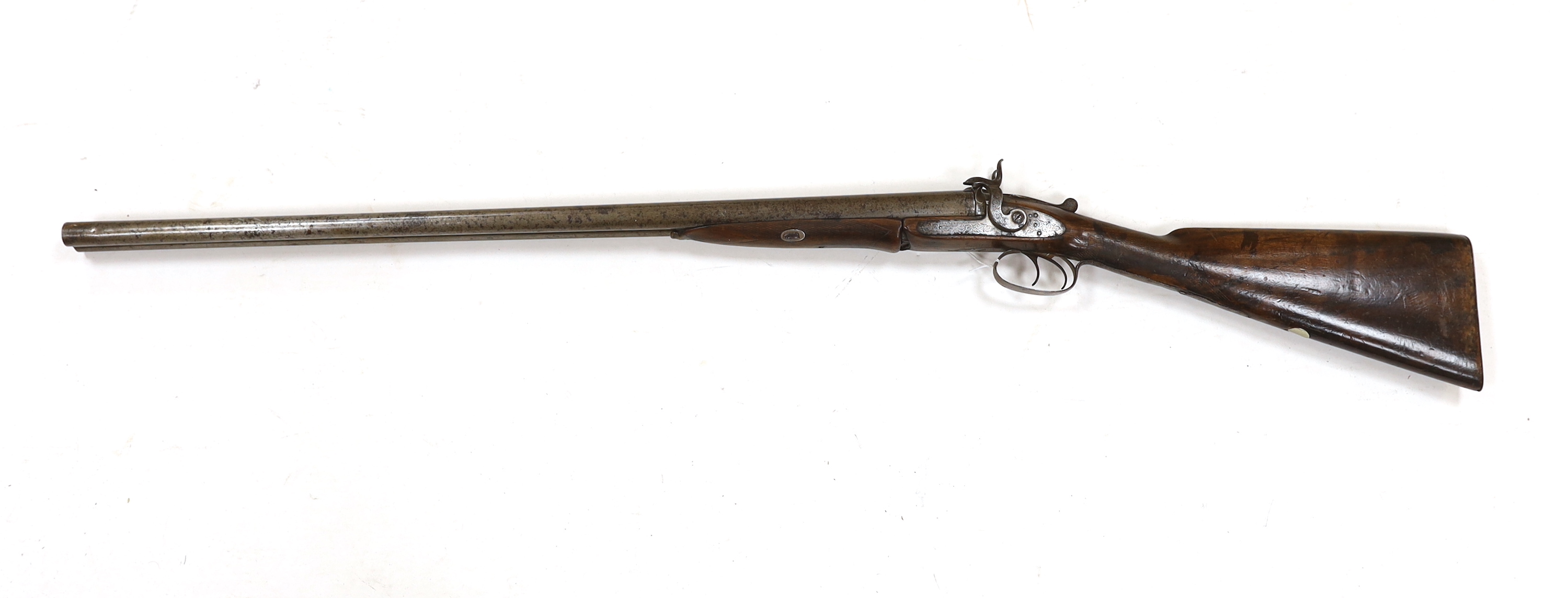 A double barrel pinfire shotgun by Wesley Richards with patent knuckle joint and top lever, barrels 74.5cm